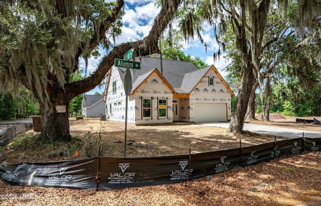 1 Alumni Rd, Beaufort, SC 29907 - property in mid-construction with a garage, central air condition unit, a shingled roof, and concrete driveway