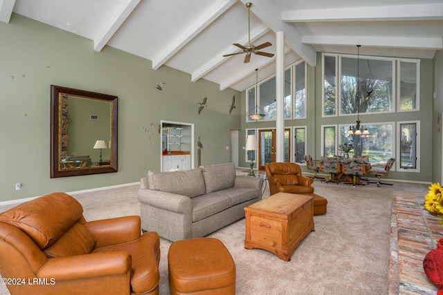 carpeted living room featuring beam ceiling, ceiling fan with notable chandelier, and high vaulted ceiling