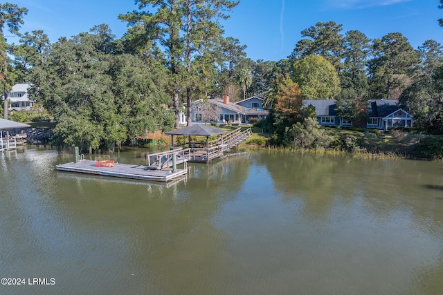 dock area featuring a gazebo and a water view