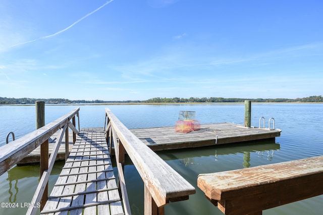 view of dock with a water view