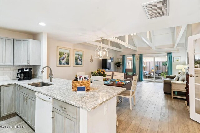 45 Queens Folly Rd Unit 794, Hilton Head Island, SC 29928 - kitchen with white dishwasher, a peninsula, open floor plan, light wood-style floors, and gray cabinetry