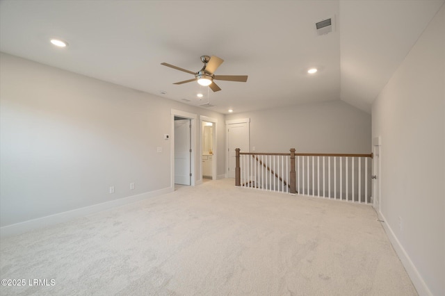 29 Fairfield Rd, Beaufort, SC 29907 - carpeted empty room with vaulted ceiling and ceiling fan