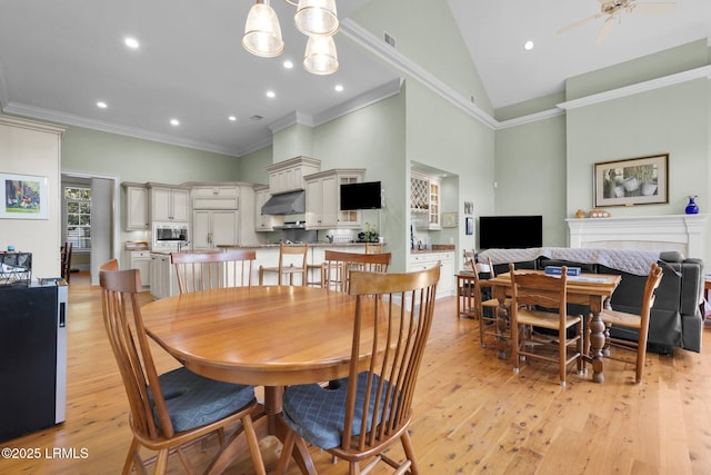 44 Richland Dr, Bluffton, SC 29910 - dining room featuring high vaulted ceiling, light wood-style flooring, a ceiling fan, ornamental molding, and recessed lighting