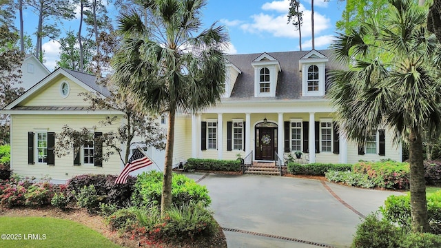 44 Richland Dr, Bluffton, SC 29910 - view of front of house with a porch and a shingled roof