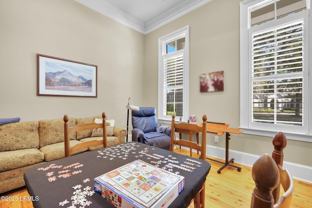 44 Richland Dr, Bluffton, SC 29910 - living area featuring crown molding, wood finished floors, baseboards, and plenty of natural light