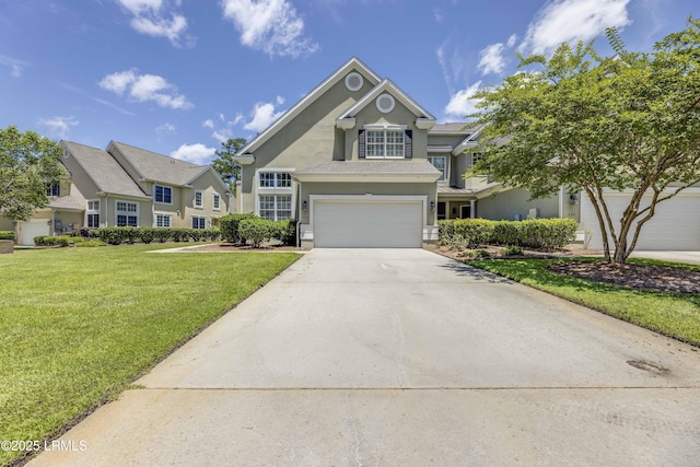 300 Persimmon Cir, Hardeeville, SC 29927 - traditional-style house with concrete driveway, stucco siding, a front yard, and an attached garage