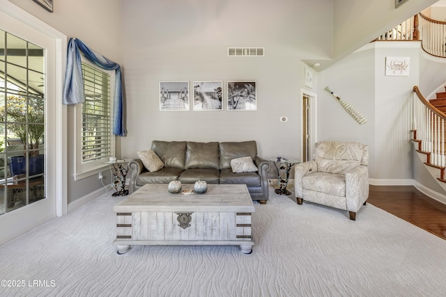 300 Persimmon Cir, Hardeeville, SC 29927 - carpeted living room with stairs and baseboards
