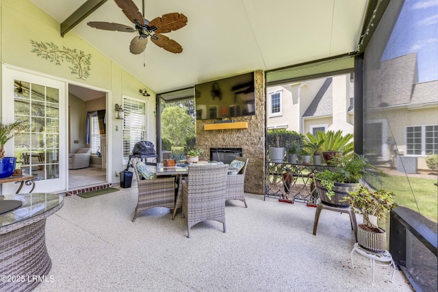 300 Persimmon Cir, Hardeeville, SC 29927 - sunroom with a ceiling fan, outdoor dining area, and an outdoor stone fireplace