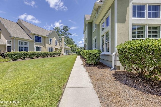 300 Persimmon Cir, Hardeeville, SC 29927 - surrounding community featuring a yard and a residential view