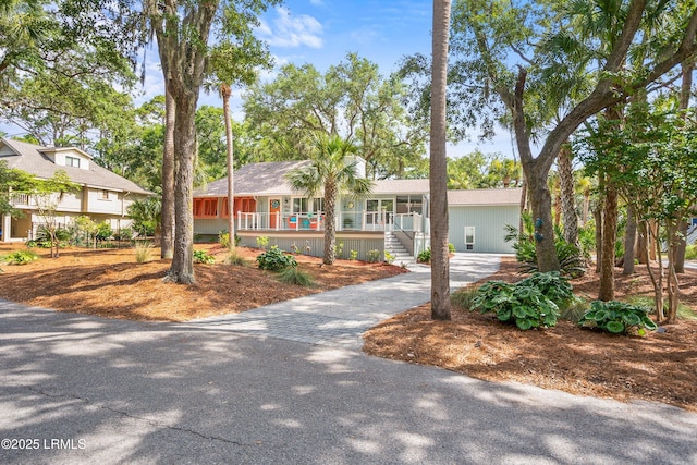 106 Sand Piper Run, Fripp Island, SC 29920 - single story home featuring covered porch and driveway