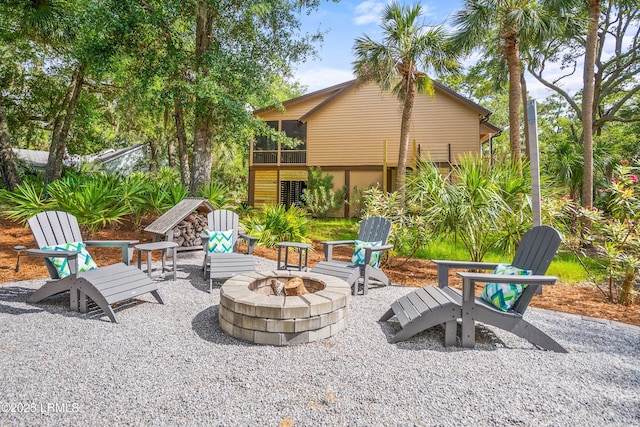 106 Sand Piper Run, Fripp Island, SC 29920 - view of patio / terrace with a fire pit and a sunroom