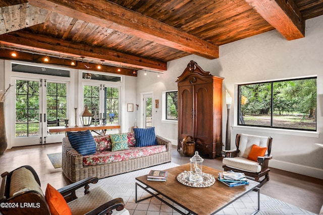 living room featuring wood ceiling, track lighting, french doors, and beamed ceiling