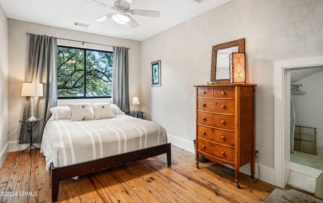 bedroom featuring ceiling fan and light wood-type flooring