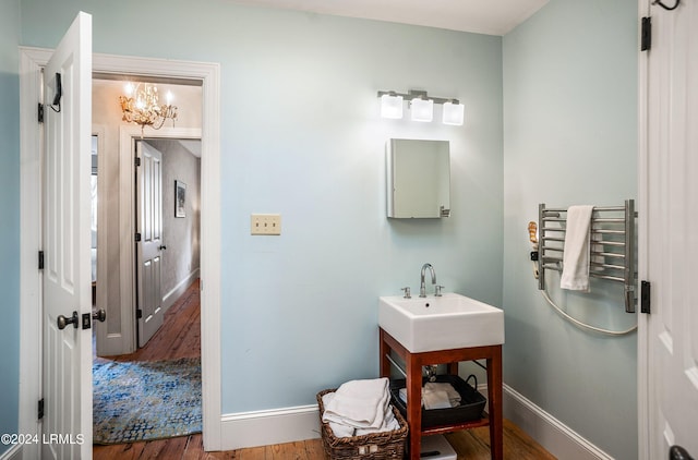 bathroom featuring vanity and hardwood / wood-style flooring