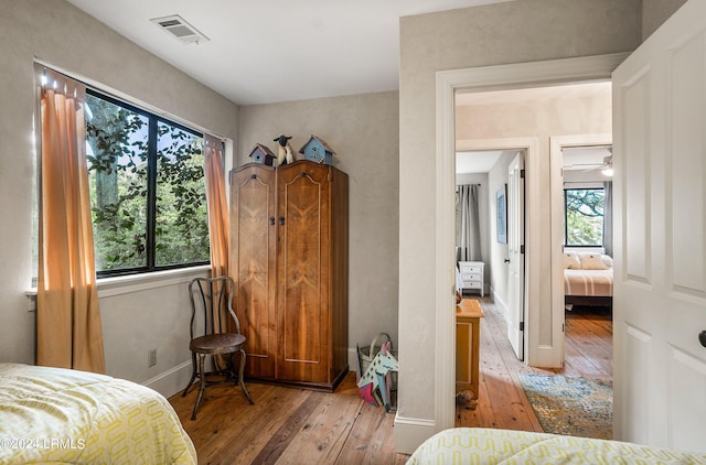 bedroom with light hardwood / wood-style flooring