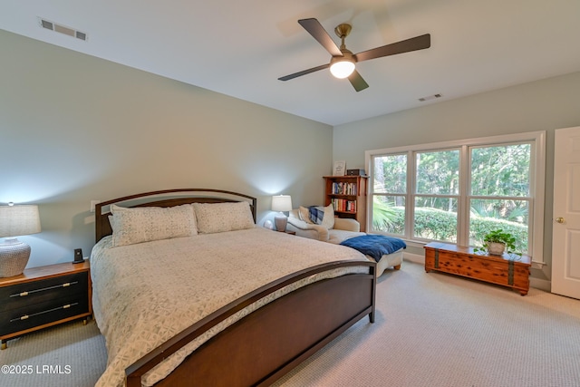 1120 Palmetto Pt, Dataw Island, SC 29920 - bedroom featuring light colored carpet and ceiling fan