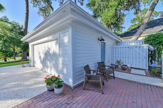 1120 Palmetto Pt, Dataw Island, SC 29920 - view of patio / terrace featuring an outbuilding