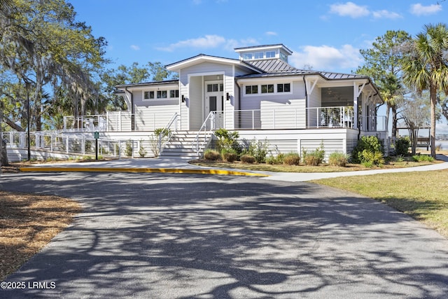 51 White Oaks Cir, Bluffton, SC 29910 - view of front of home with a standing seam roof and metal roof