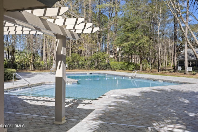 51 White Oaks Cir, Bluffton, SC 29910 - community pool featuring a patio, a pergola, and view of scattered trees
