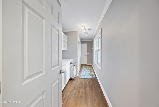 51 White Oaks Cir, Bluffton, SC 29910 - corridor with crown molding, wood finished floors, and baseboards