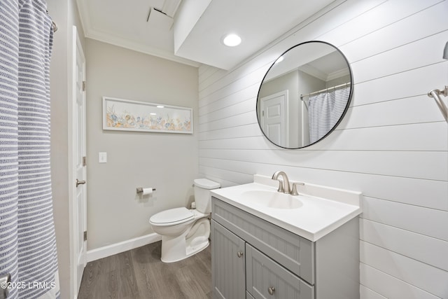 51 White Oaks Cir, Bluffton, SC 29910 - full bathroom featuring wooden walls, wood finished floors, vanity, toilet, and ornamental molding