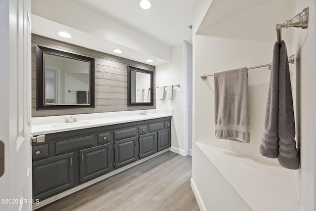 51 White Oaks Cir, Bluffton, SC 29910 - bathroom featuring double vanity, baseboards, recessed lighting, and wood finished floors