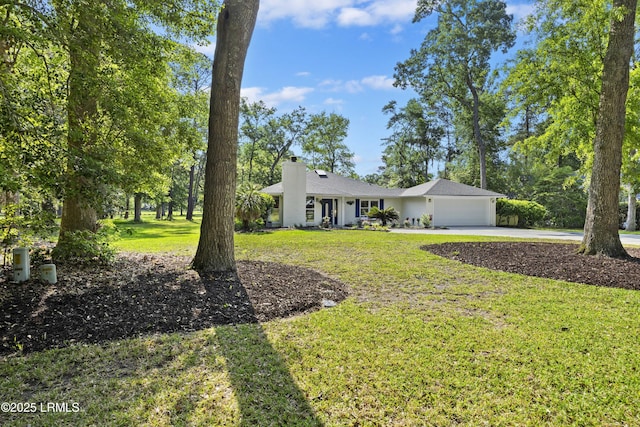 51 White Oaks Cir, Bluffton, SC 29910 - view of front facade with a garage, driveway, a chimney, and a front lawn
