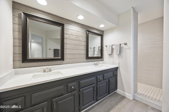 51 White Oaks Cir, Bluffton, SC 29910 - full bath with double vanity, a tile shower, wood finished floors, and recessed lighting