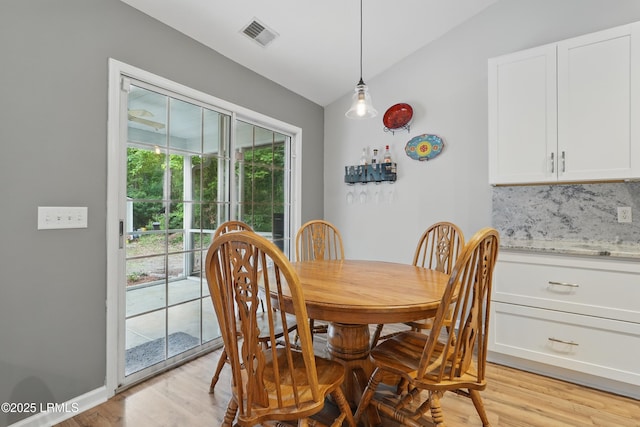 29 Wiregrass Way, Bluffton, SC 29910 - dining space with lofted ceiling and light wood finished floors