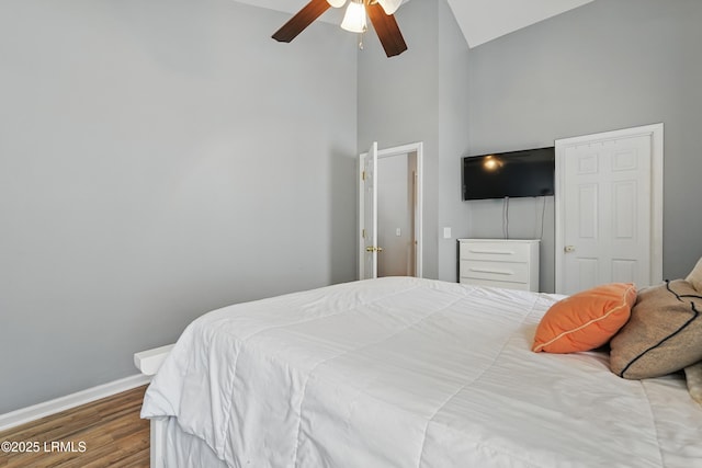 29 Wiregrass Way, Bluffton, SC 29910 - bedroom with high vaulted ceiling, wood finished floors, baseboards, and a ceiling fan
