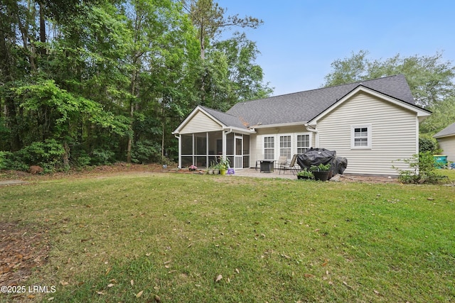 29 Wiregrass Way, Bluffton, SC 29910 - back of house featuring a sunroom, a lawn, and a patio
