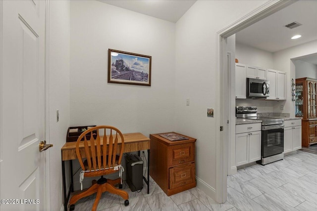 61 Hampton Cir, Bluffton, SC 29909 - home office featuring light marble finish floors and baseboards