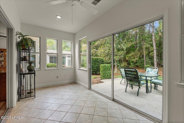 61 Hampton Cir, Bluffton, SC 29909 - unfurnished sunroom featuring tile patterned floors and baseboards