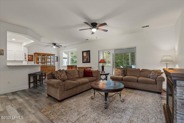 61 Hampton Cir, Bluffton, SC 29909 - living area with a ceiling fan, wood finished floors, and baseboards