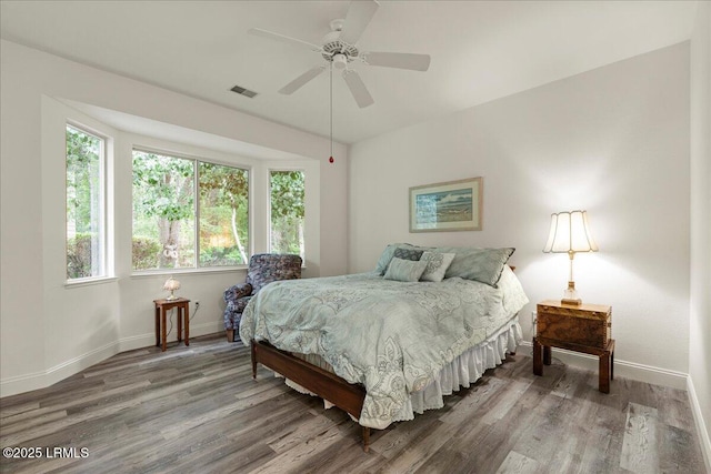 61 Hampton Cir, Bluffton, SC 29909 - bedroom featuring baseboards, wood finished floors, and a ceiling fan