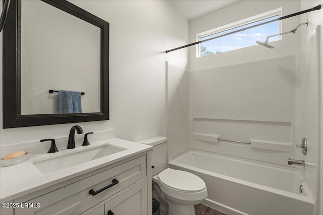 61 Hampton Cir, Bluffton, SC 29909 - full bath featuring shower / bath combination, toilet, vanity, wood finished floors, and a textured wall