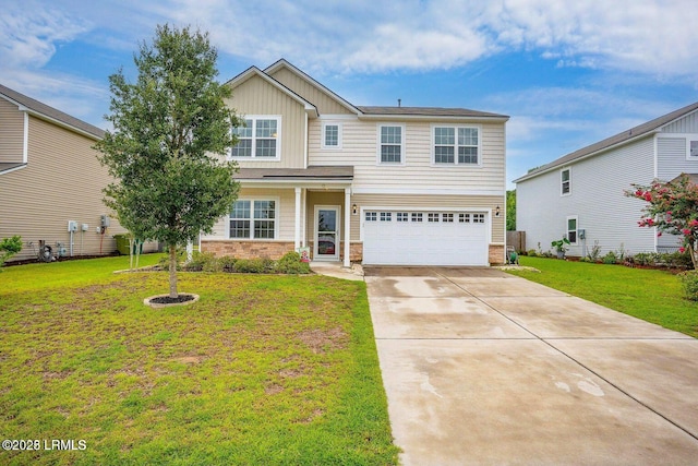 13 Combahee Way, Beaufort, SC 29906 - view of front of property with an attached garage, board and batten siding, concrete driveway, and a front yard