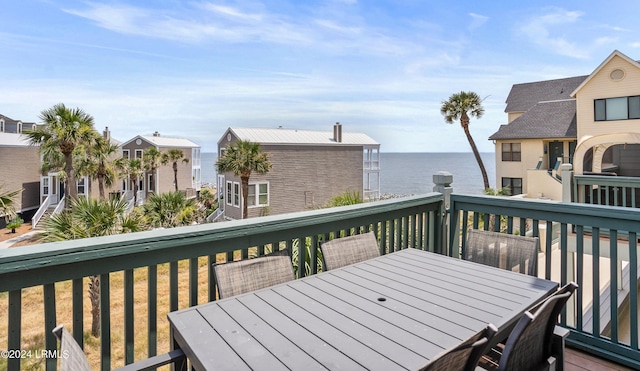 deck featuring a water view