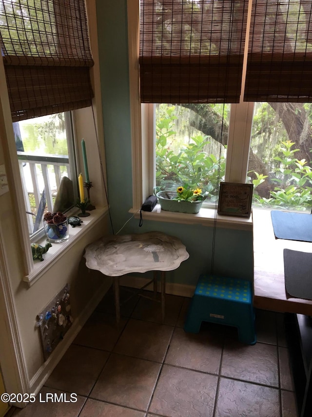 802 12th St, Port Royal, SC 29935 - dining space featuring tile patterned flooring and baseboards