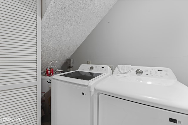 400 William Hilton Pkwy Unit 110, Hilton Head Island, SC 29926 - laundry room with independent washer and dryer and a textured ceiling