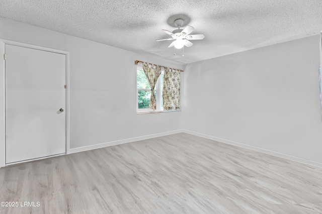 400 William Hilton Pkwy Unit 110, Hilton Head Island, SC 29926 - spare room with ceiling fan, a textured ceiling, and light wood-style floors