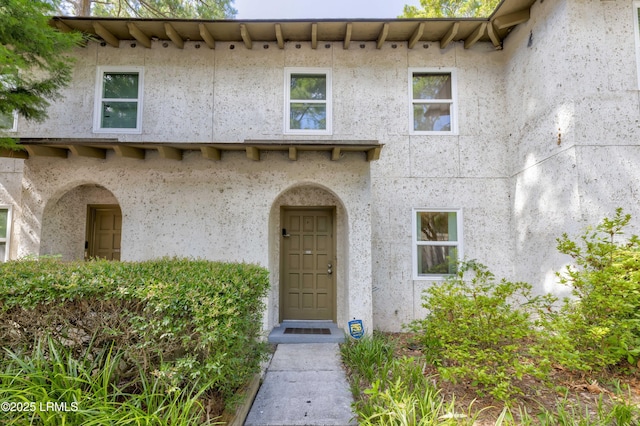 400 William Hilton Pkwy Unit 110, Hilton Head Island, SC 29926 - view of exterior entry with stucco siding