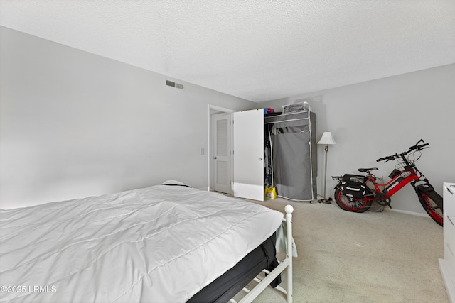 400 William Hilton Pkwy Unit 110, Hilton Head Island, SC 29926 - bedroom with carpet floors and a textured ceiling
