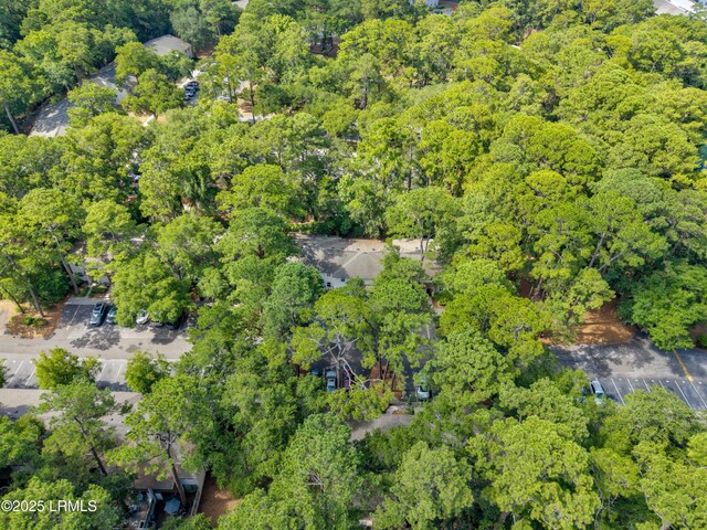 400 William Hilton Pkwy Unit 110, Hilton Head Island, SC 29926 - aerial view of property and surrounding area featuring a heavily wooded area