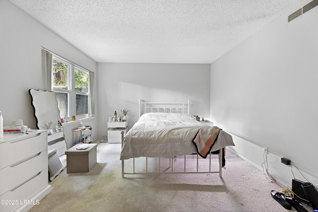 400 William Hilton Pkwy Unit 110, Hilton Head Island, SC 29926 - bedroom with carpet and a textured ceiling