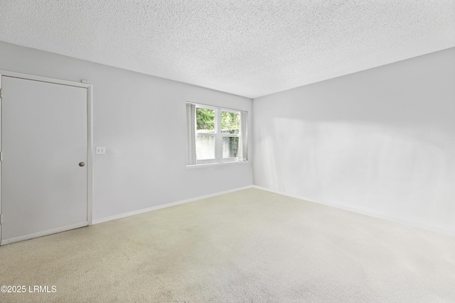 400 William Hilton Pkwy Unit 110, Hilton Head Island, SC 29926 - carpeted spare room featuring a textured ceiling