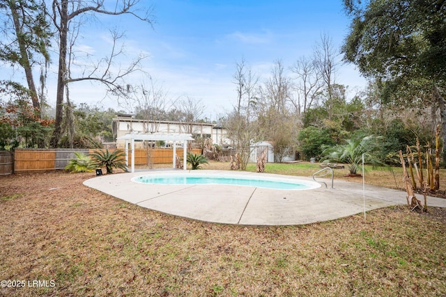 view of pool with a pergola and a patio area