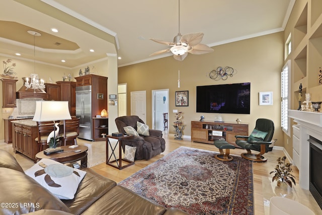 102 Lake Somerset Cir, Bluffton, SC 29909 - living room featuring a towering ceiling, crown molding, recessed lighting, light wood-style flooring, and ceiling fan