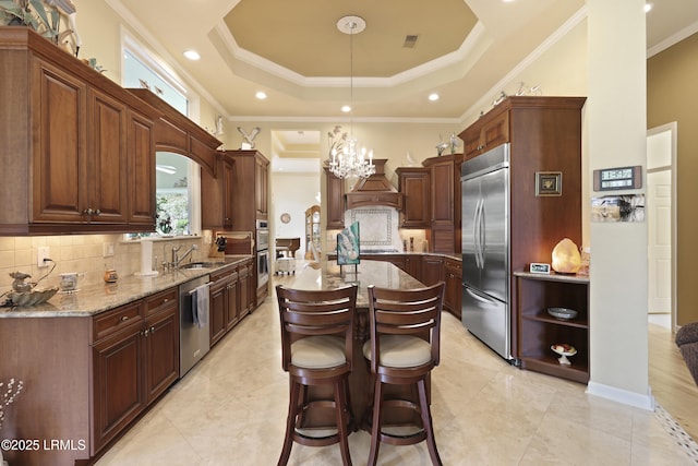 102 Lake Somerset Cir, Bluffton, SC 29909 - kitchen featuring stainless steel appliances, premium range hood, ornamental molding, backsplash, and light stone counters