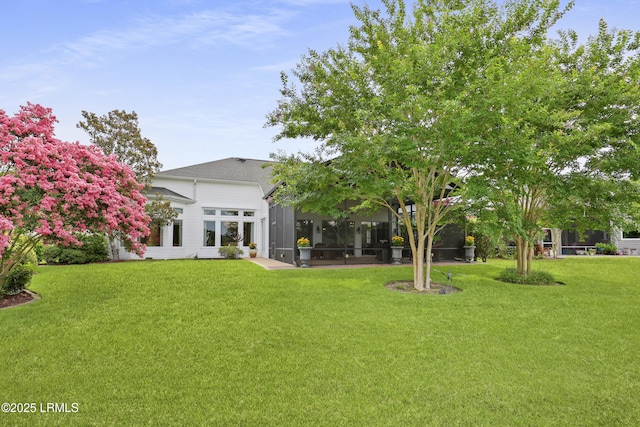 102 Lake Somerset Cir, Bluffton, SC 29909 - view of green lawn with a sunroom